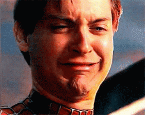 A Close Up Of A Man With A Beard Making A Sad Face GIF