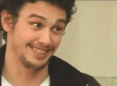 A Close Up Of A Man With A Beard Smiling GIF