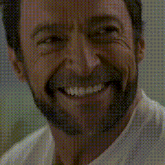 A Close Up Of A Man With A Beard Smiling GIF