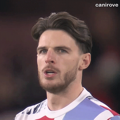 A Close Up Of A Man With A Beard Wearing A Soccer Jersey . GIF