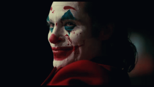 A Close Up Of A Man With A Bloody Face GIF