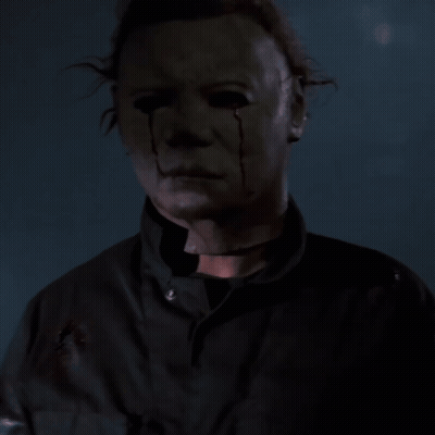 A Close Up Of A Man With A Bloody Face GIF
