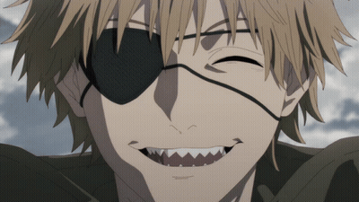 A Close Up Of A Man With An Eye Patch And Sharp Teeth Smiling GIF