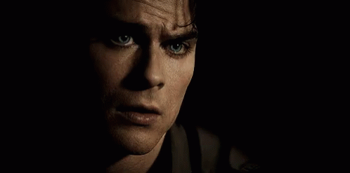 A Close Up Of A Man With Blue Eyes GIF