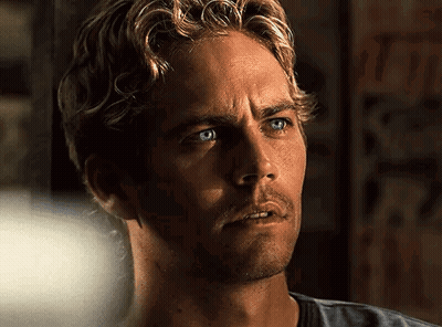 A Close Up Of A Man With Blue Eyes And Blonde Hair GIF