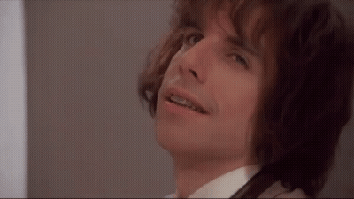 A Close Up Of A Man With Braces On His Teeth Looking Up . GIF