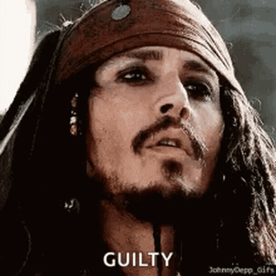 A Close Up Of A Man With Dreadlocks And A Beard . GIF