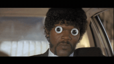 A Close Up Of A Man With Googly Eyes On His Face GIF