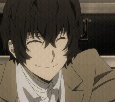 A Close Up Of A Man With His Eyes Closed Smiling GIF