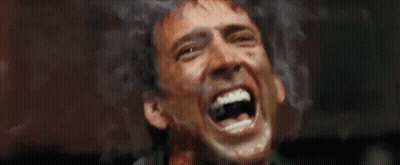 A Close Up Of A Man With His Mouth Open GIF
