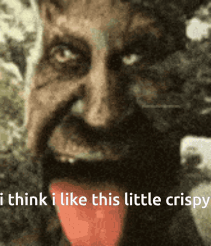 A Close Up Of A Man With His Tongue Out And The Words " I Think I Like This Little Crispy " GIF