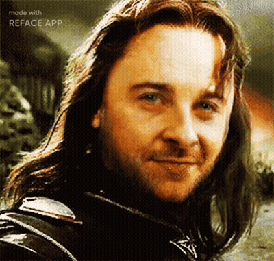 A Close Up Of A Man With Long Hair And A Beard . GIF