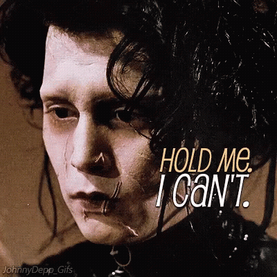 A Close Up Of A Man With The Words Hold Me I Can 'T GIF