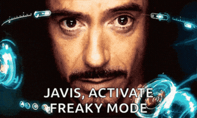 A Close Up Of A Man With The Words Javis Activate Freaky Mode Below Him GIF
