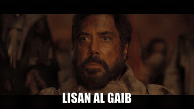 A Close Up Of A Man With The Words Lisan Al Gaib Written Above Him GIF