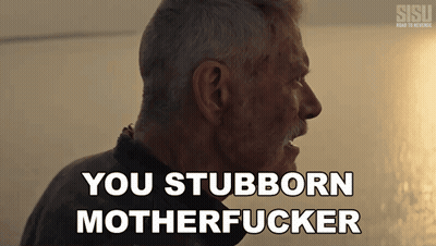 A Close Up Of A Man With The Words You Stubborn Motherfucker Behind Him GIF