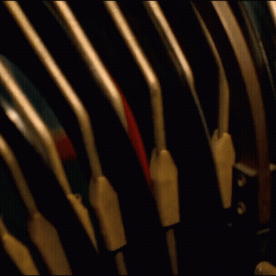 A Close Up Of A Mechanical Device With The Number 1 On The Bottom GIF