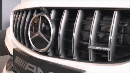A Close Up Of A Mercedes Amg Grille GIF