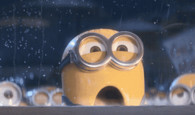 A Close Up Of A Minion 'S Face With A Hole In It GIF