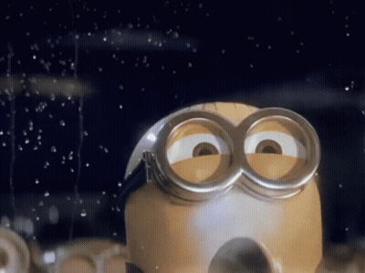 A Close Up Of A Minion With A Pair Of Goggles GIF