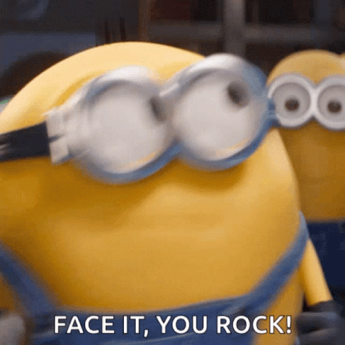A Close Up Of A Minion With The Words Face It You Rock Below It GIF