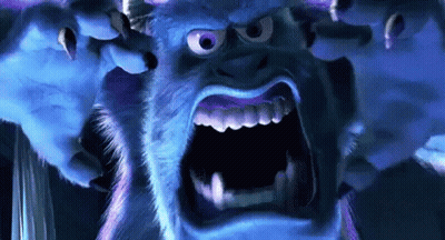 A Close Up Of A Monster From Monsters Inc With Its Mouth Open GIF