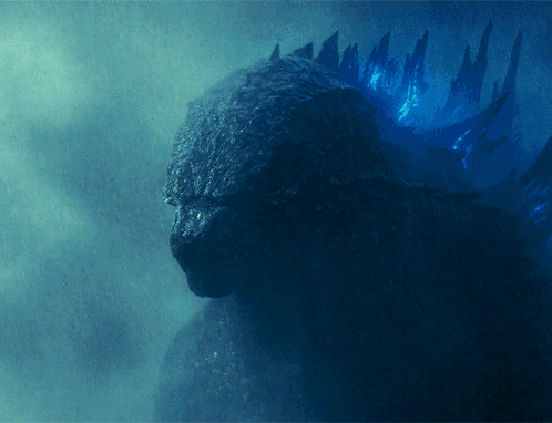 A Close Up Of A Monster In The Dark GIF