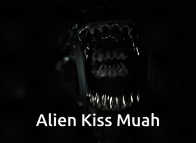 A Close Up Of A Monster Mouth With The Words Alien Kiss Muah Below It GIF