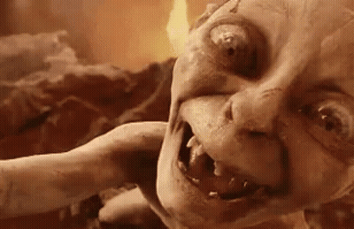 A Close Up Of A Monster 'S Face With A Flame Behind It . GIF