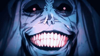 A Close Up Of A Monster 'S Face With Large Teeth And Red Eyes GIF