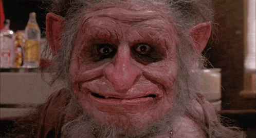 A Close Up Of A Monster With A Green Light On His Nose GIF
