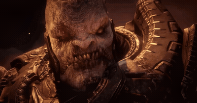 A Close Up Of A Monster With A Tire On His Back GIF