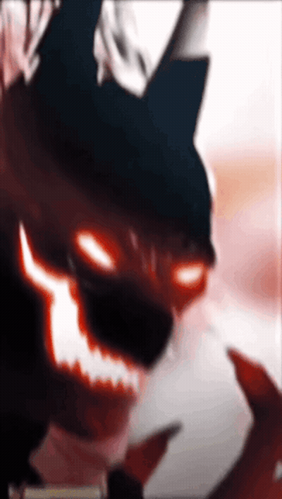 A Close Up Of A Monster With Red Eyes GIF