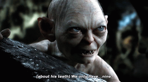 A Close Up Of A Monster With The Words " About His Teeth We Only Have... Nine " GIF