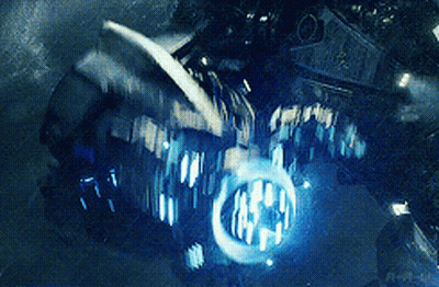 A Close Up Of A Motorcycle With A Blue Light Coming Out Of The Headlight GIF