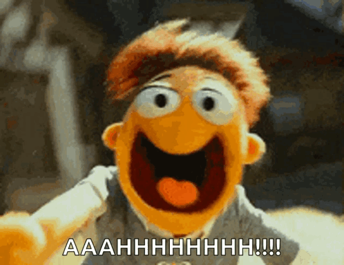 A Close Up Of A Muppet That Says Aaahhhhh !!! GIF