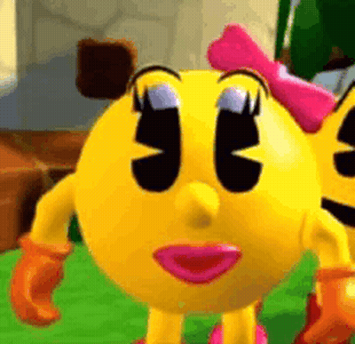 A Close Up Of A Pac Man Cartoon Character With A Pink Bow . GIF
