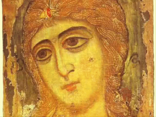 A Close Up Of A Painting Of A Man 'S Face GIF