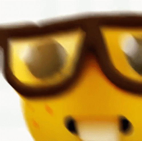 A Close Up Of A Pair Of Glasses On A Yellow Object GIF