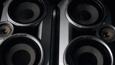 A Close Up Of A Pair Of Speakers With A Mesh Covering GIF