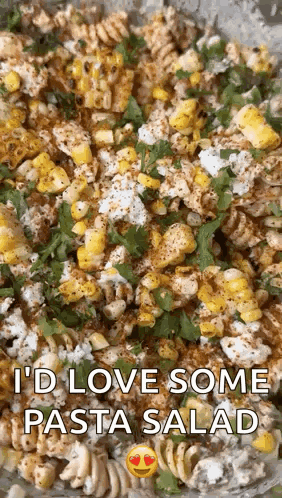 A Close Up Of A Pasta Salad With Corn And Cheese With The Words `` I 'D Love Some Pasta Salad '' Above It . GIF