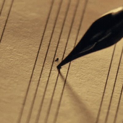 A Close Up Of A Pen Writing The Letter G GIF