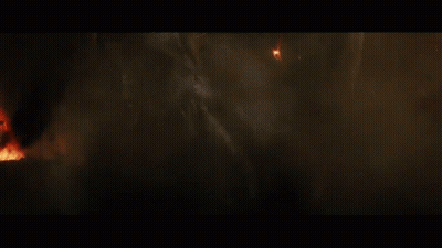 A Close Up Of A Person Being Struck By Lightning In A Dark Room GIF