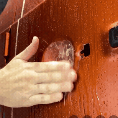 A Close Up Of A Person Cleaning A Car Door GIF