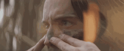 A Close Up Of A Person Cleaning Their Face GIF