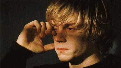 A Close Up Of A Person Covering Their Ears GIF