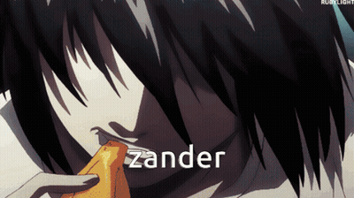 A Close Up Of A Person Eating A Banana With The Word Zander In The Corner GIF