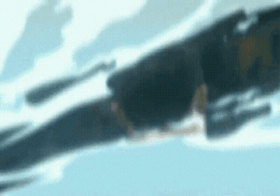 A Close Up Of A Person Flying Through The Air With A Blue Sky In The Background . GIF