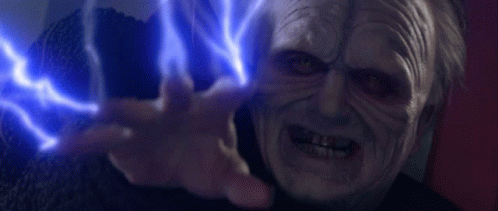 A Close Up Of A Person Holding A Blue Light GIF