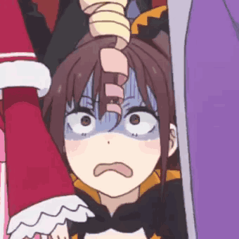 A Close Up Of A Person Holding A Girl 'S Head With A Surprised Look On Their Face . GIF